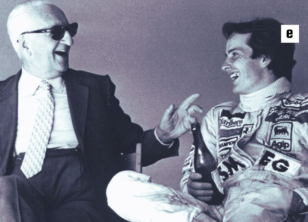 یک راننده فراری در کنار مدیر اسمگ، هر دو لبخندزنان و دوستانه.

